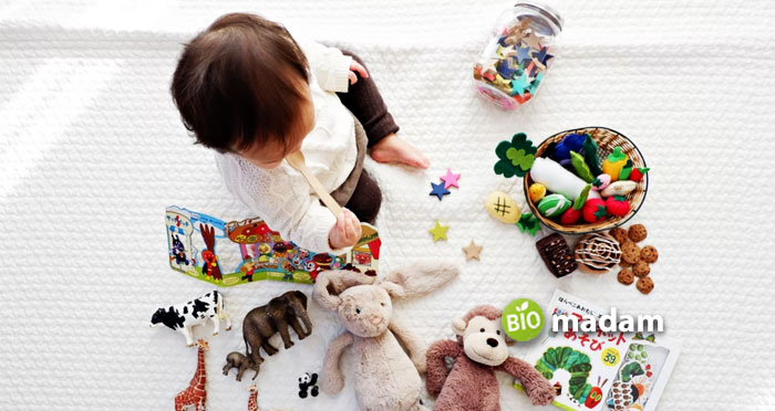 baby-playing-with-toys