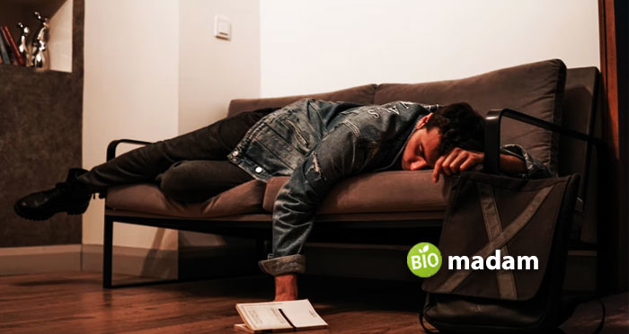 a-man-sleeping-on-the-sofa