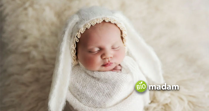 Newborn-Baby-Wrapped-in-a-Blanket-with-Bunny-Ears